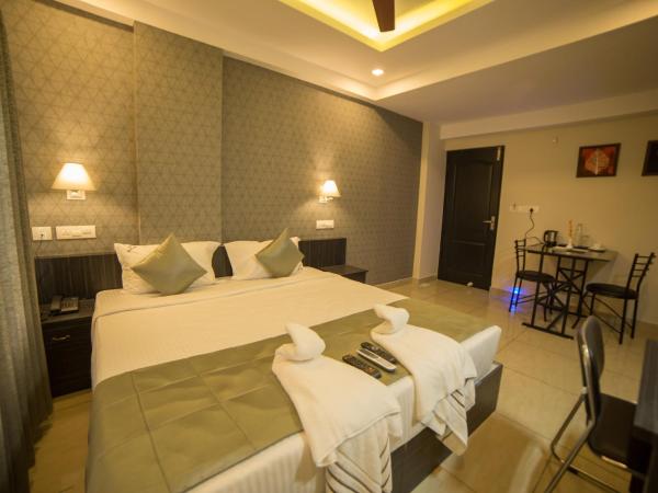 South Gate Residency : photo 4 de la chambre chambre supérieure lit queen-size