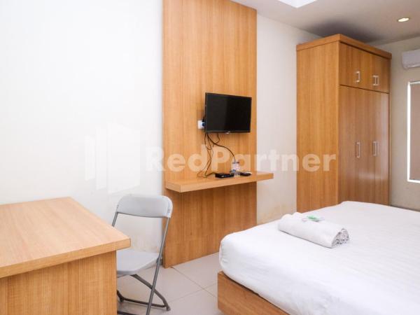 Garuda Guesthouse Yogyakarta RedPartner : photo 4 de la chambre chambre double deluxe