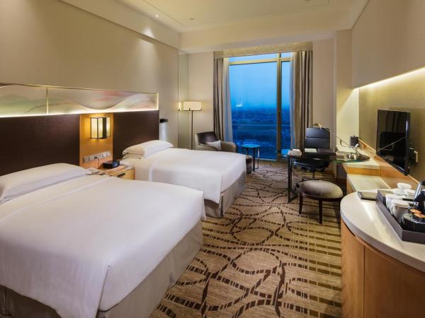 DoubleTree by Hilton Hangzhou East : photo 1 de la chambre chambre lits jumeaux exécutive - accès au salon