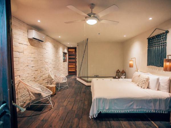 Orchid House Tulum Beach : photo 4 de la chambre suite principale calanthe - vue sur jardin