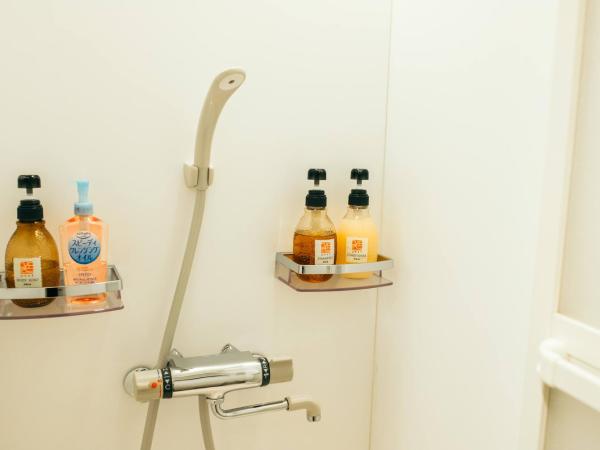 Guest House KuKu : photo 2 de la chambre dortoir réservé aux femmes de style japonais avec futon simple