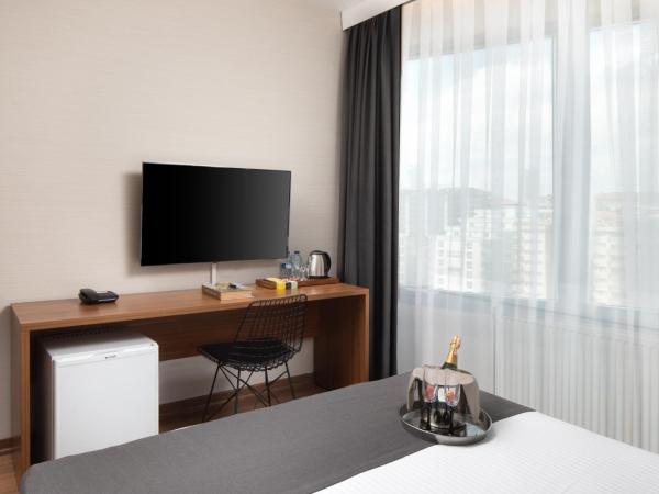 Nish Suites Atasehir : photo 7 de la chambre chambre triple deluxe