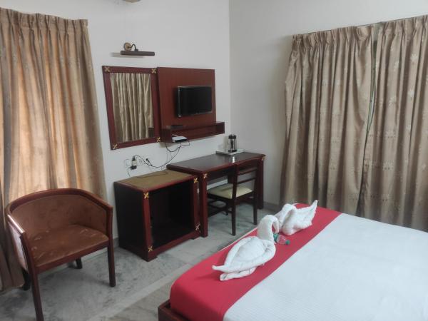 karthika residency : photo 2 de la chambre chambre double deluxe (2 adultes + 1 enfant)