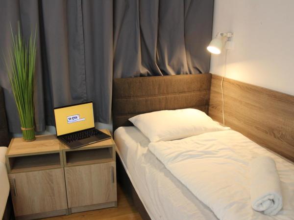WOW City Hostel : photo 4 de la chambre chambre lits jumeaux avec salle de bains privative