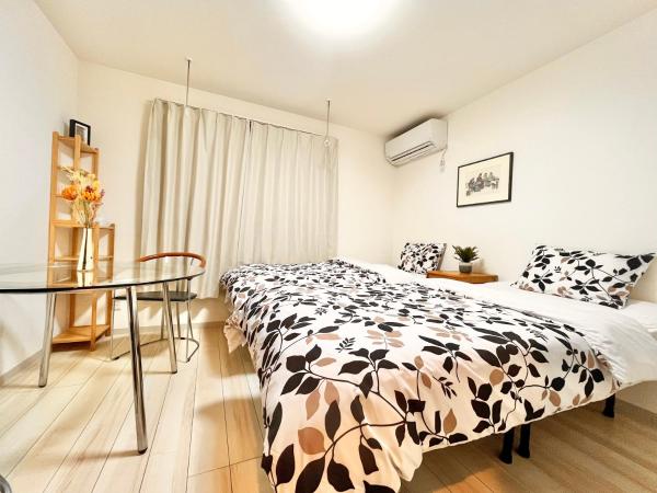 ティエラ北池袋 : photo 1 de la chambre chambre lits jumeaux