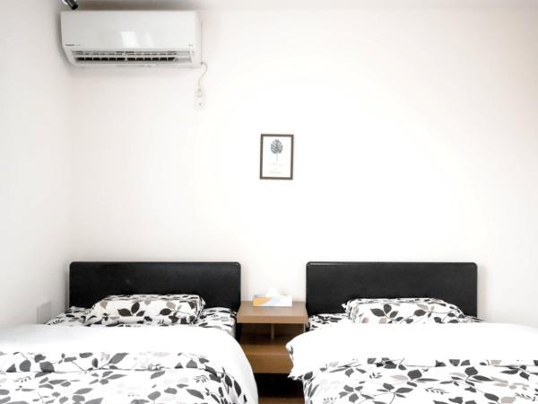 ティエラ北池袋 : photo 4 de la chambre petite chambre lits jumeaux
