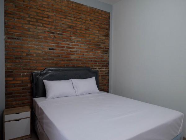 RedDoorz @ Jalan Ringroad Selatan 2 : photo 5 de la chambre chambre double standard