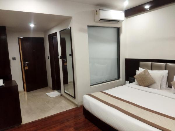 TGI Apple Inn : photo 6 de la chambre chambre lit king-size supérieure