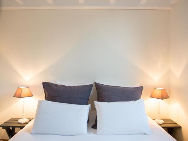 Le Lodge du Cap Ferret : photo 5 de la chambre appartement - vue sur jardin