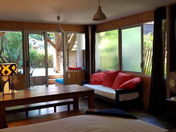 Le Lodge du Cap Ferret : photo 1 de la chambre appartement - vue sur jardin