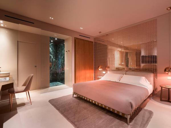 Taormina Infinity Suites : photo 6 de la chambre suite lit queen-size