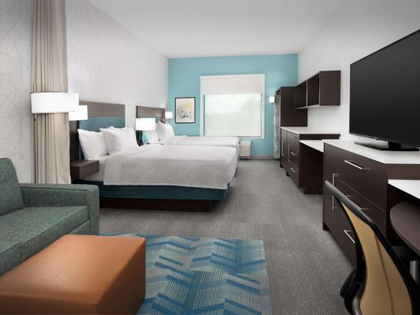 Home2 Suites Orlando Southeast Nona : photo 2 de la chambre suite studio avec 2 lits queen-size