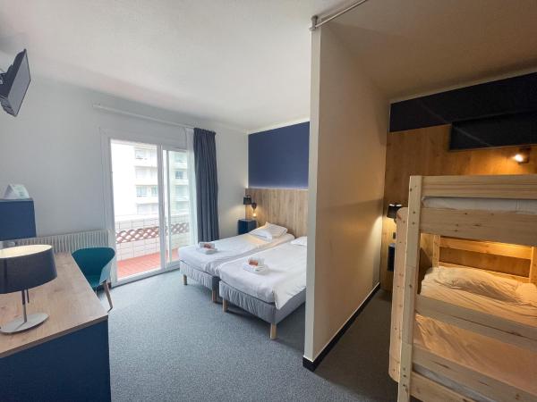 Villages Clubs du Soleil - LA BAULE : photo 1 de la chambre chambre quadruple avec salle de bains privative séparée