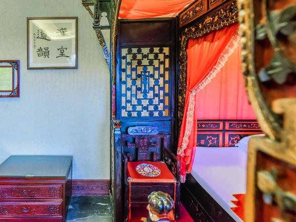 ChengDu Wuhou Temple Han Dynasty Hotel : photo 4 de la chambre chambre familiale traditionnelle chinoise