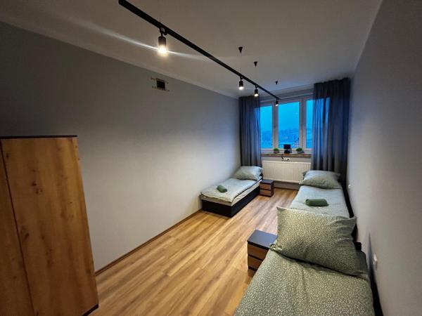 CZARNA PERŁA : photo 3 de la chambre chambre triple basique avec salle de bains commune