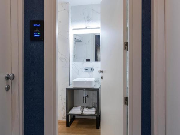 London Hotel : photo 5 de la chambre chambre double ou lits jumeaux avec salle de bains privative externe