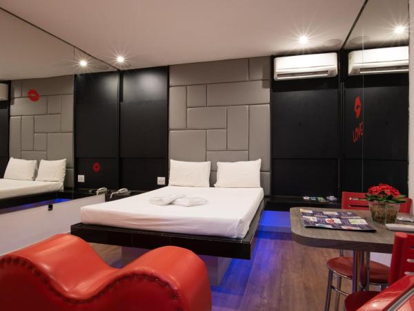 Motel Fantasy 1 : photo 9 de la chambre suite deluxe avec lit king-size