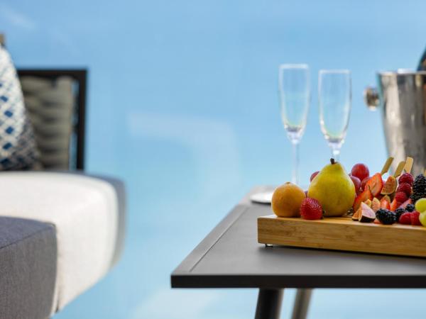 Hilton Cancun, an All-Inclusive Resort : photo 1 de la chambre suite lit king-size - côté océan