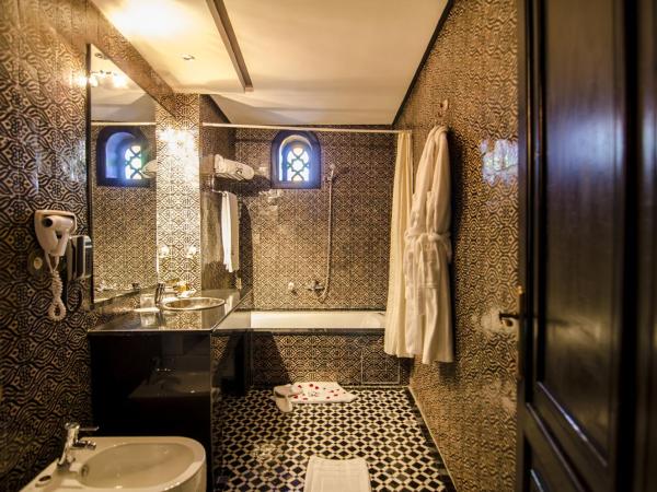 Palais Ommeyad Suites & Spa : photo 1 de la chambre suite junior avec bain à remous