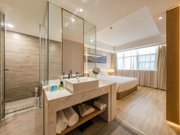 Atour X Hotel Wuxi New Zone Gelunbu Plaza : photo 3 de la chambre jimu suite