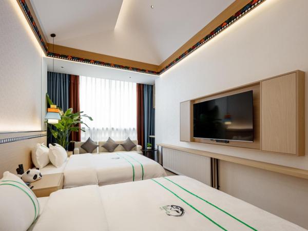 Xishu Garden Inn : photo 2 de la chambre chambre lits jumeaux confort