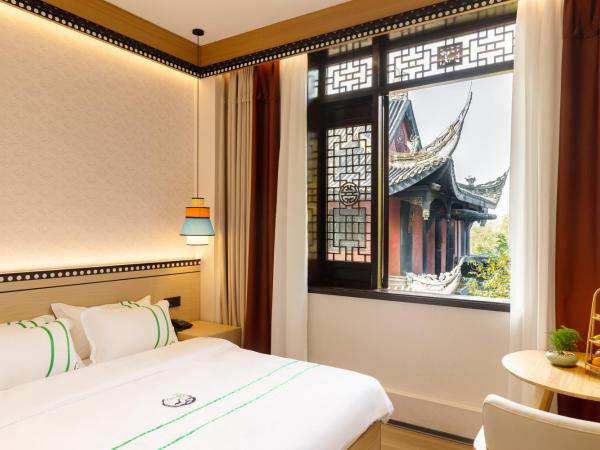 Xishu Garden Inn : photo 1 de la chambre suite 2 chambres