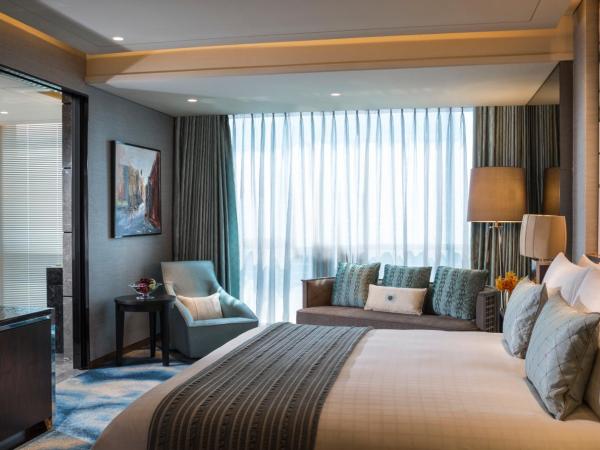 Four Seasons Hotel Shenzhen : photo 1 de la chambre suite lit king-size ambassador