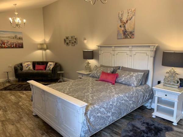 Millbrae Lodges : photo 1 de la chambre suite deluxe avec lit king-size