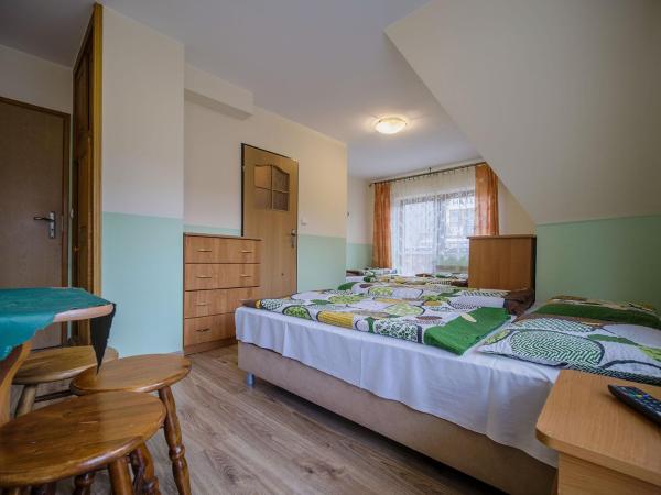 U KOMINKA : photo 2 de la chambre chambre familiale avec balcon