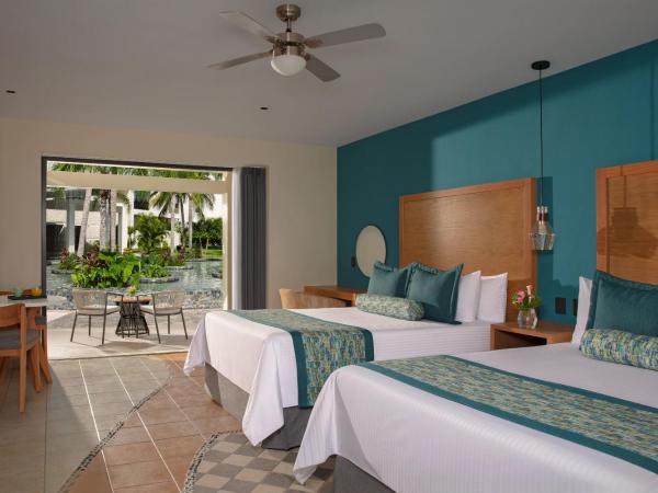 Dreams Cozumel Cape Resort & Spa : photo 2 de la chambre suite junior preferred club avec lits doubles - vue tropicale