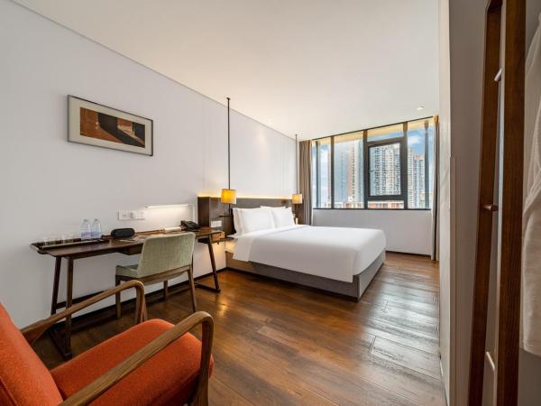 Wuyu Hotel - Chongqing Jiangbei Airport : photo 5 de la chambre chambre supérieure lit queen-size