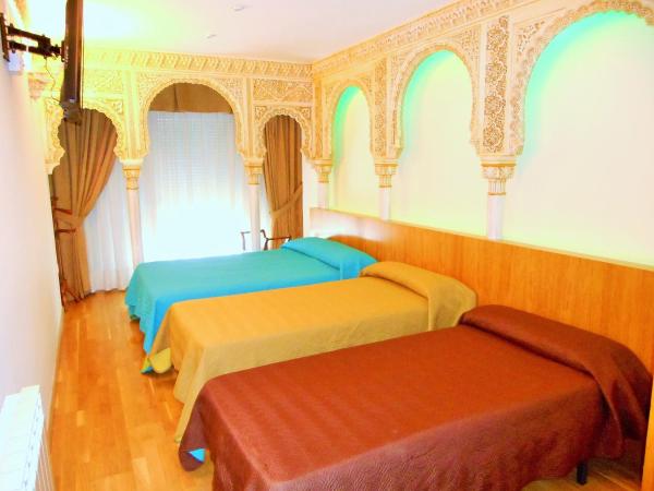 Martin House & Granada : photo 2 de la chambre chambre triple confort