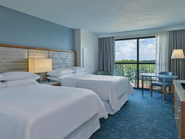 Walt Disney World Dolphin : photo 2 de la chambre chambre avec 2 lits doubles et balcon - vue sur complexe hôtelier - entrée anticipée aux parcs à thèmes disney incluse