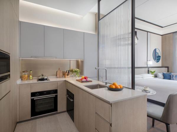 Marriott Executive Apartments Hangzhou : photo 1 de la chambre studio lit king-size - vue sur ville