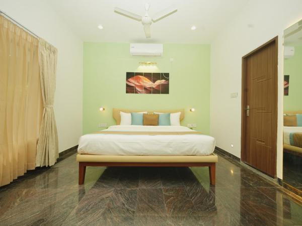 Bay Breeze Suites : photo 2 de la chambre chambre deluxe