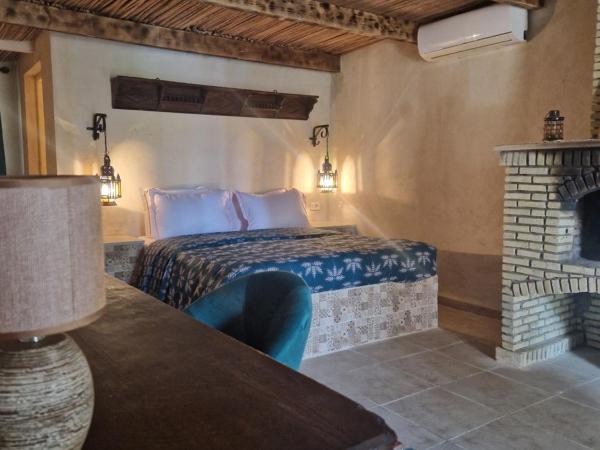 Les Bungalows d'Armelle : photo 1 de la chambre chambre triple