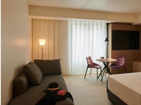 Palazzo Sangiorgio : photo 3 de la chambre chambre deluxe (2 adultes + 1 enfant)