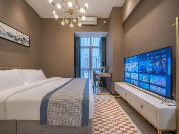 Gepai Executive Apartment - Shenzhen Futian Convention and Exhibition Center : photo 3 de la chambre deluxe executive king room (washing machine + refrigerator)