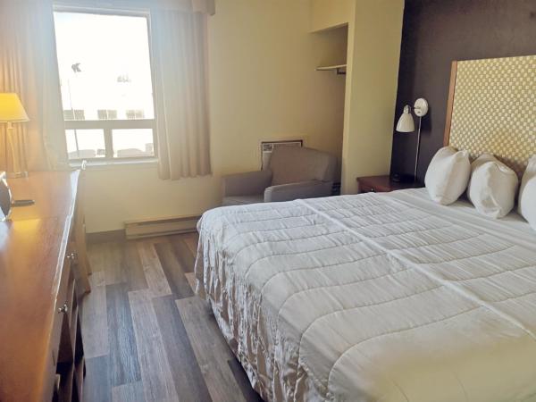Travelodge by Wyndham Edmonton West : photo 1 de la chambre chambre lit king-size - non-fumeurs