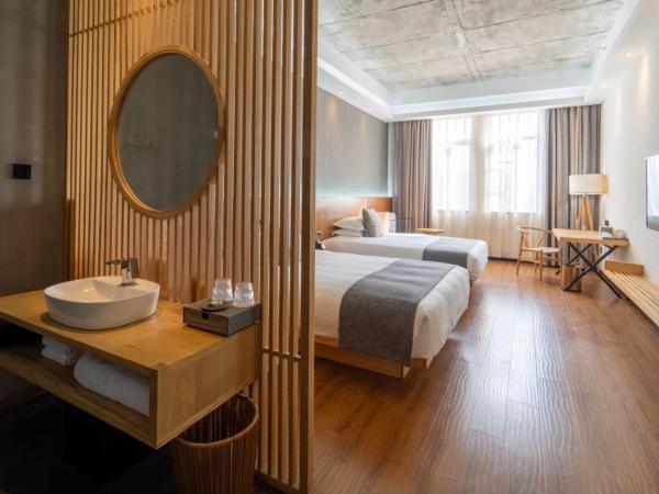 Lin Yin Art Hotel Shanghai(Pudong airport) : photo 3 de la chambre chambre lits jumeaux deluxe