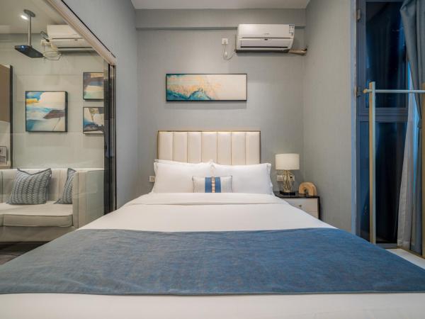 Gepai Executive Apartment - Shenzhen Futian Convention and Exhibition Center : photo 7 de la chambre one bedroom (washing machine + refrigerator)