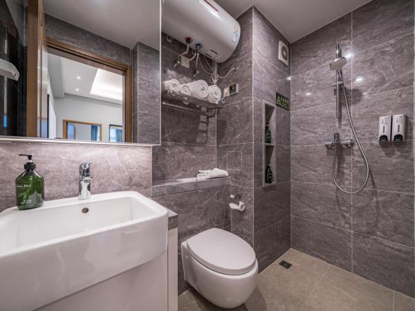 Gepai Executive Apartment - Shenzhen Futian Convention and Exhibition Center : photo 8 de la chambre one bedroom (washing machine + refrigerator)