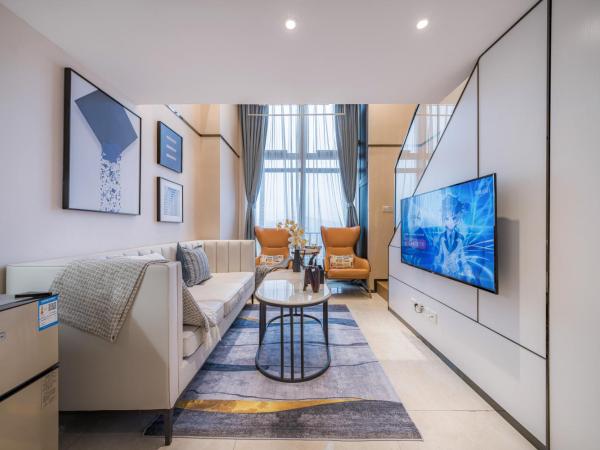 Gepai Executive Apartment - Shenzhen Futian Convention and Exhibition Center : photo 1 de la chambre deluxe loft king room (drying washer + refrigerator)