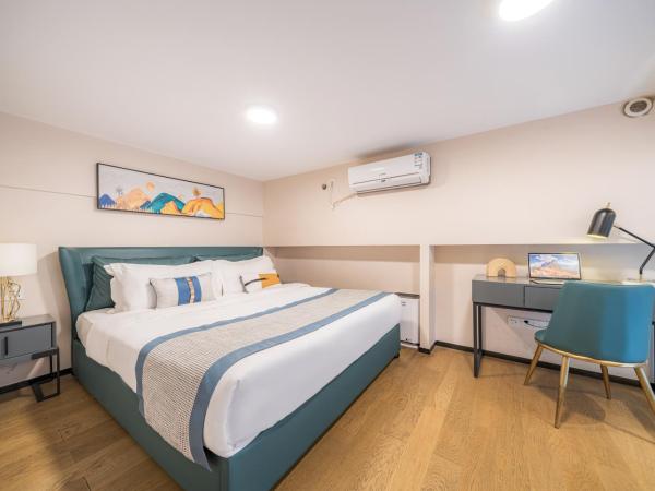 Gepai Executive Apartment - Shenzhen Futian Convention and Exhibition Center : photo 4 de la chambre deluxe loft king room (drying washer + refrigerator)