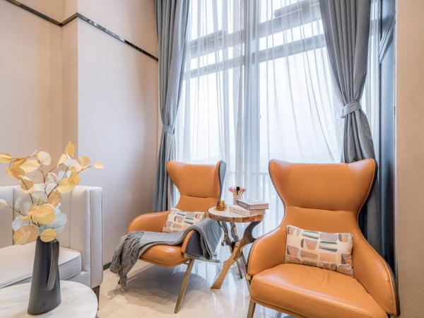 Gepai Executive Apartment - Shenzhen Futian Convention and Exhibition Center : photo 7 de la chambre deluxe loft king room (drying washer + refrigerator)