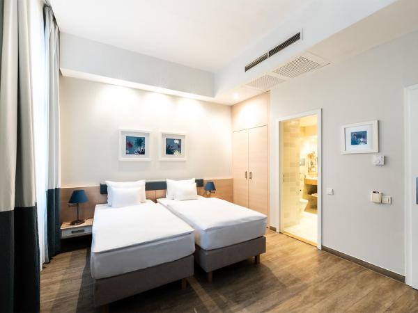 Atrium Fashion Hotel : photo 9 de la chambre chambre familiale