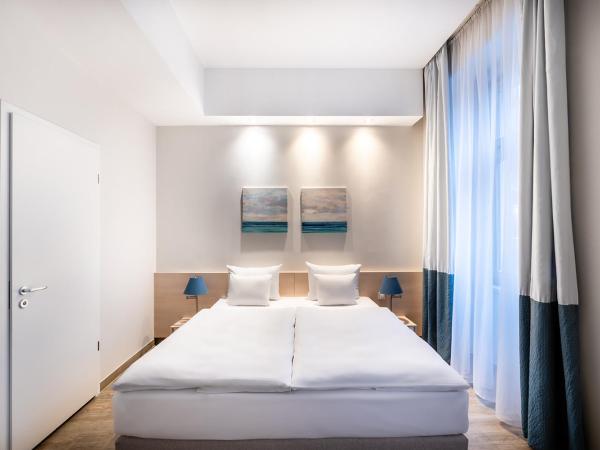 Atrium Fashion Hotel : photo 4 de la chambre chambre double ou lits jumeaux deluxe - vue sur ville