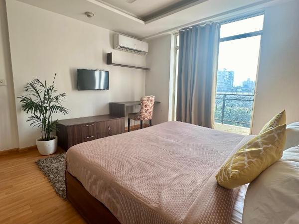 Flamingo Hotel Sector 67 I Studio Rooms I Gurgaon : photo 6 de la chambre studio avec balcon