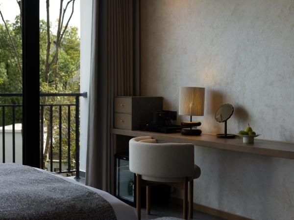 GINLAN JIA RESORT Yuhang Hangzhou : photo 1 de la chambre chambre lit queen-size - vue sur jardin