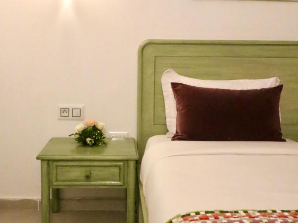 El Oumara Hotel : photo 3 de la chambre chambre lits jumeaux avec salle de bains privative